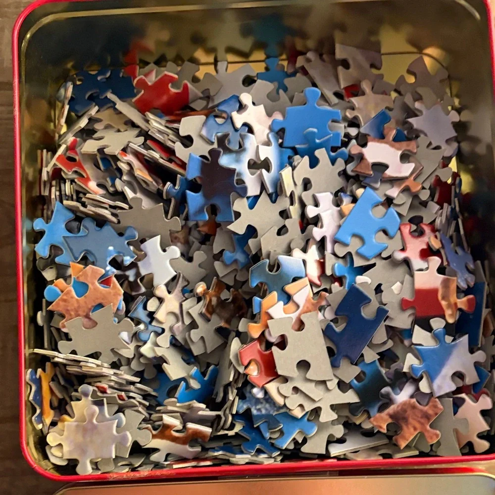 Rudolph the Red-Nosed Reindeer Collector's tin Puzzle -550 pieces made once.